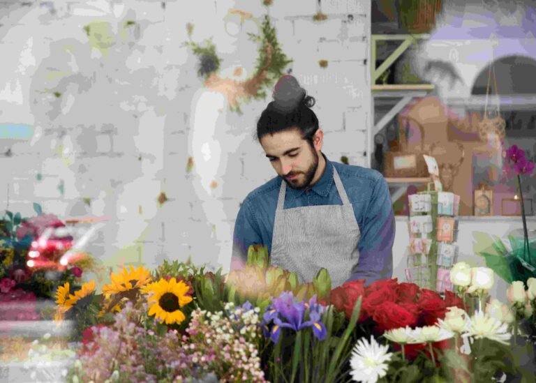 portrait-male-florist-standing-colorful-flowers-flower-shop (2)